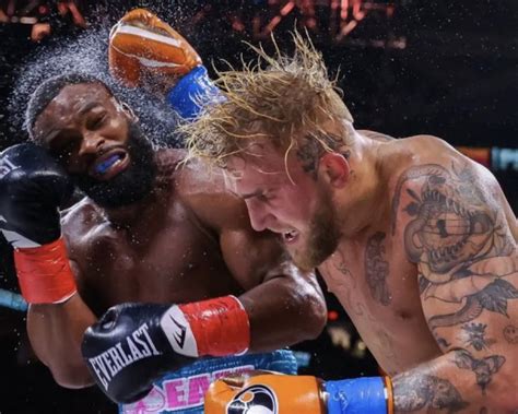 Jake Paul defeats Tyron Woodley by split decision: .